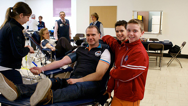 Generous donor with his children.