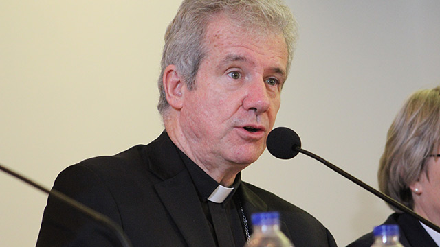 Archbishop Lépine speaking during the interfiath panel held at the Grand Séminaire de Montréal.