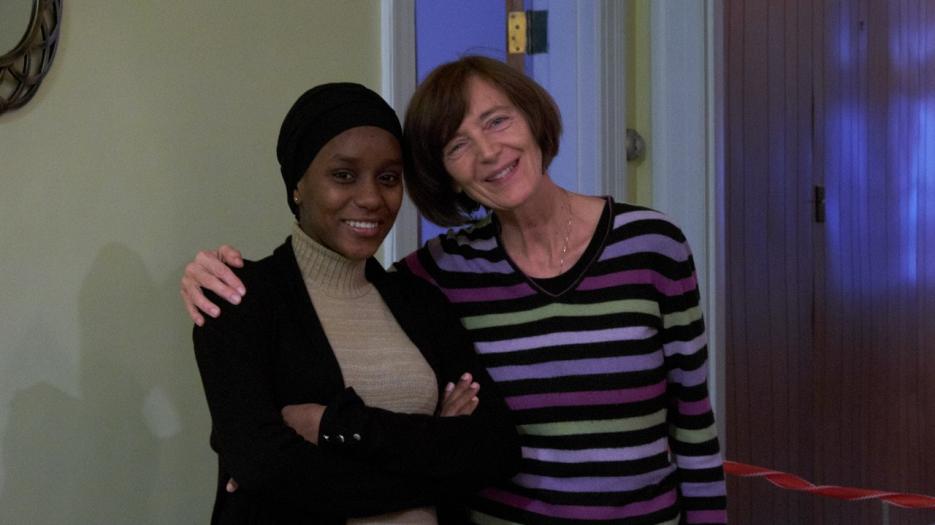 Left, Aminate, a resident with a volunteer. (Photo: Richard Maltais)