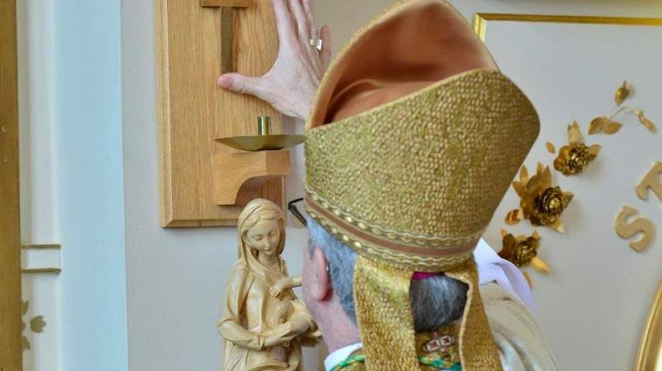 Archbishop Lépine blesses the crosses of the church consecration. (Photo: Dominic Richer, priest)