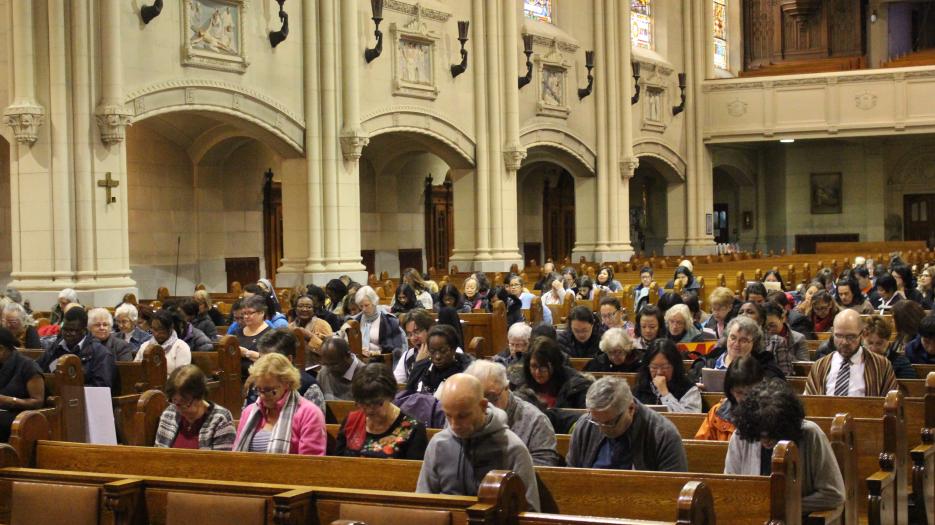 The catechists during a meditative Gospel reading with music in the background.