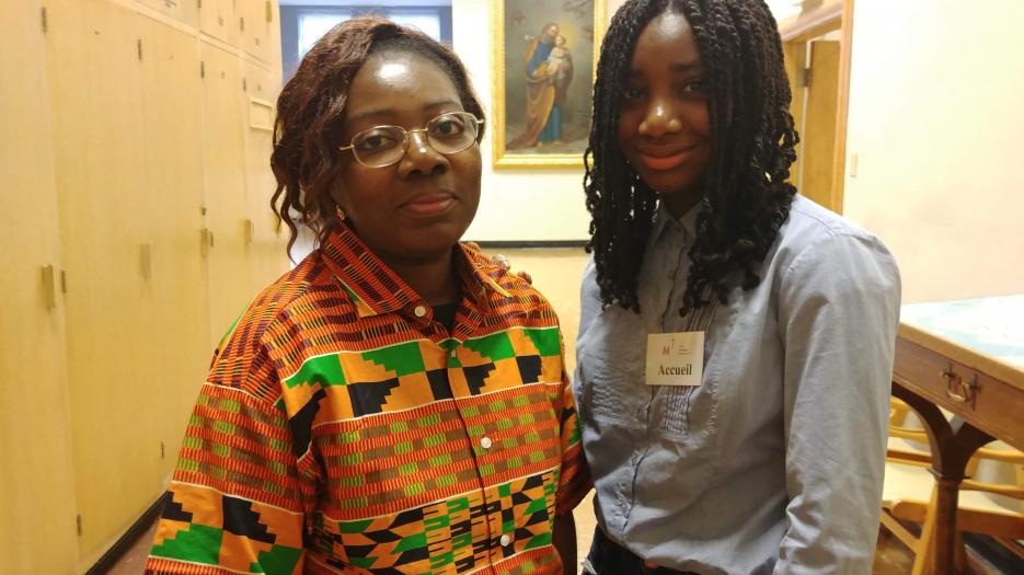 Jeanne Folly, assistant to the director of the Office for Development and Planned Giving, with her daughter Julie.